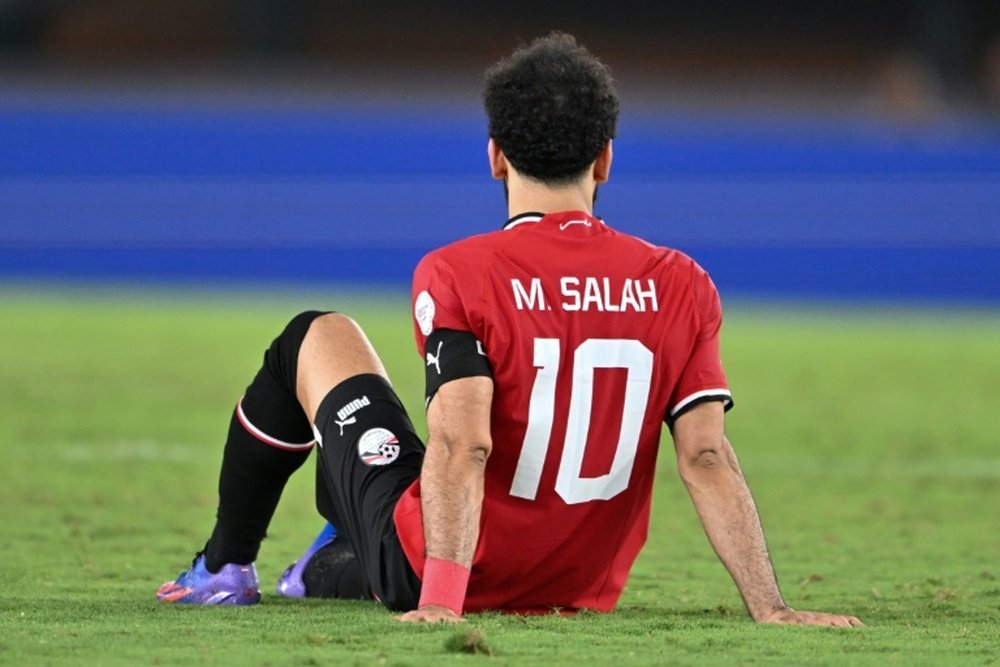 Salah, lesionado e substituído entre lágrimas. AFP